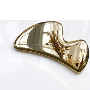 Outil facial Gua Sha de luxe en laiton massif, poli miroir, en métal doré, pour sculpter le visage et le corps, plaque de raclage pour la mâchoire, vente en gros - Product Image 1