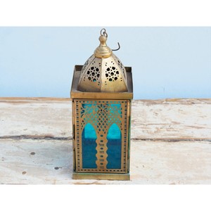 <b>Brass</b> Rectangular <b>Lantern</b> with Blue Glass Panels and Intricate Cutouts for Home Decoration Durable Finish - Product Image 1