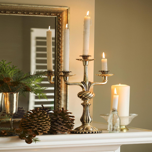 Gold vintage brass two <b>light</b> floral candelabra featuring a central bud stem accent, available at wholesale prices. - Product Image 5