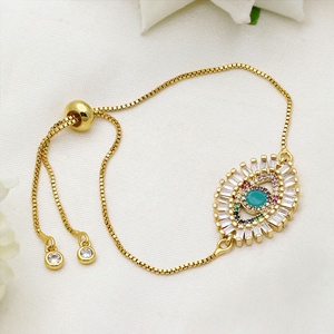 Pulsera ajustable de plata de ley 925 bañada en oro con circonitas baguette y ojo turco, joyería fina al por mayor, Memoria Jewels - Product Image 1