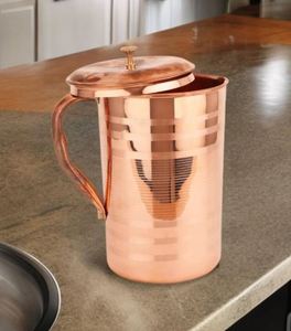 El jarro de cobre es un recipiente tradicional hecho de cobre puro, ampliamente utilizado en India para almacenar y servir agua. Es tanto un recipiente para el agua como para el agua potable. - Product Image 3