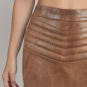 Vente en gros Nouveautés 2026 Jupes mi-longues de luxe en similicuir PU taille haute pour femmes - Product Image 6
