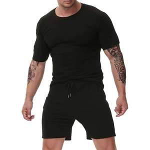 Ensemble de survêtement décontracté pour homme en polyester/coton, respirant et léger, collection automne, vente chaude, design 2-en-1 pour l'entraînement - Product Image 1