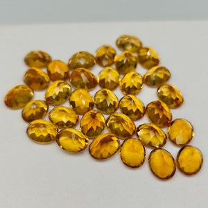 พลอยซิทรินธรรมชาติทรงรีขนาด 9x7 มม. เจียระไนเหลี่ยม สีเหลืองทอง สำหรับทำเครื่องประดับ ขายส่ง HASNAIN GEMS - Product Image 3