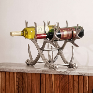 Porte-vin de bureau métallique inspiré des bois de cerf, conçu pour contenir quatre bouteilles en toute sécurité, disponible à prix de gros. - Product Image 1
