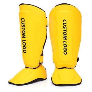 Protège-tibias et protège-pieds légers et durables jaune et noir pour l'entraînement de combat, en cuir avec fermeture auto-agrippante, équipement de boxe protecteur - Product Image 1