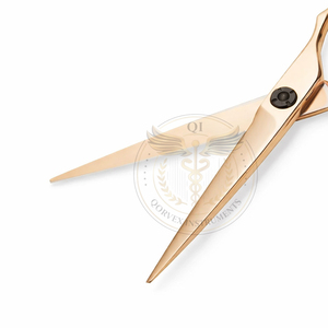 Tijeras profesionales de peluquería doradas, hechas de acero inoxidable de alta calidad. - Product Image 2