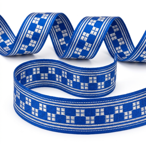 ริบบิ้นผ้าแจ็คการ์ดสีน้ำเงินรอยัลขนาด 25 มม. ของบริษัทนีลกามัล อินดัสทรีส์ สำหรับตกแต่งขอบของขวัญและเสื้อผ้า - Product Image 1