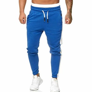 Pantalon de survêtement gris pour homme avec bande latérale blanche, taille élastique, décontracté, séchage rapide, imperméable, respirant, en toile, pour l'hiver - Product Image 3