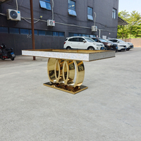Table à manger ovale en acier inoxydable avec incrustation de nacre et base en anneau doré, console de mariage de luxe