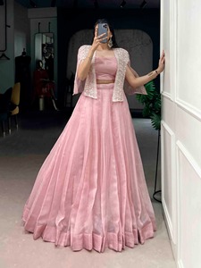 Lehenga brodé avec des détails en sequins et broderies, confectionné dans un tissu Allnen Crush doux, accompagné d'un chemisier et d'un koti. - Product Image 1