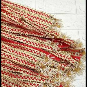 Ensemble de latkans de mariage en velours rouge, exquis et fait main, conçu pour ajouter un charme royal aux lehengas, dupattas, potlis et décorations de mariage. - Product Image 1