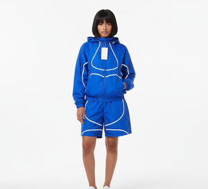 ชุดเซ็ตเสื้อแจ็คเก็ตกันลมกันน้ำผ้าไนลอนสไตล์สตรีทแวร์สำหรับผู้ชายฤดูร้อน กางเกงขาสั้น เสื้อโปโลแขนยาวแบบซิปกลับด้านได้ รับผลิตตามแบบ OEM - Product Image 1