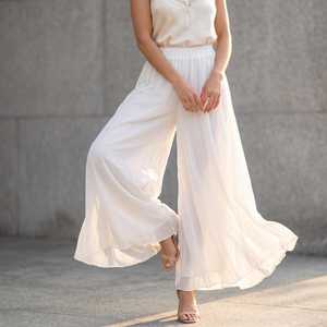 Pantalones anchos de gasa blanca para mujer, cintura alta, longitud completa, corte holgado, estilo bohemio, pantalones de verano con cintura elástica, color sólido - Product Image 1