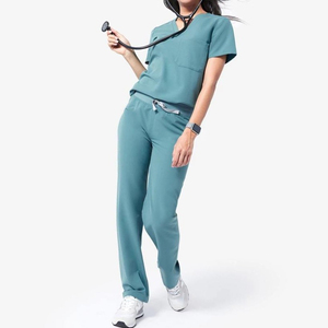 Ensemble d'uniformes médicaux unisexes en tissu extensible respirant et confortable de haute qualité, personnalisables (couleurs et logo) pour les professionnels de la beauté - Product Image 1
