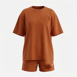 Conjunto de 2 Piezas para Mujer, Camiseta de Manga Corta de Color Sólido Tejida y Pantalones Cortos por Encima de la Rodilla, Cuello Redondo, Corte Holgado, Ropa Casual de Primavera/Verano - Product Image 1