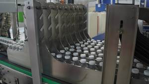 Machine d'emballage sous film rétractable automatique haute vitesse 200 BPM, entraînée par moteur électrique, pour l'emballage alimentaire et des boissons, méthode de scellage thermique par engrenage - Product Image 6