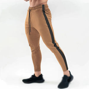 กางเกงวอร์มผู้ชาย กางเกงจ็อกเกอร์ผ้าฝ้าย กางเกงแทร็คแพนท์สำหรับฤดูใบไม้ผลิ กางเกงออกกำลังกายฟิตเนส กางเกงกีฬาฝึกซ้อม กางเกงลำลองทรงสกินนี่แบบต่อผ้า - Product Image 2