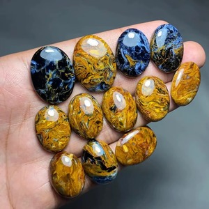พลอยพีเทอร์ไซต์สีน้ำเงินน้ำตาลทองธรรมชาติคุณภาพสูงระดับพรีเมียม รูปทรงคาโบชอง สำหรับทำเครื่องประดับ คัดสรรอย่างพิถีพิถันทุกชิ้น - Product Image 1