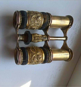 Binoculares de latón altamente decorativos con motivos de aves y componentes negros acanalados. Disponible a precios de mayorista. - Product Image 1