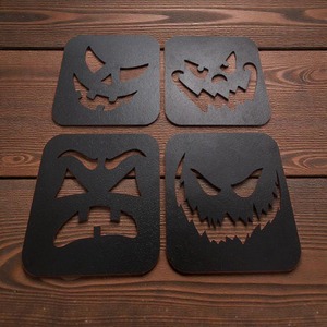 ชุดจานรองแก้วโลหะลายหน้าผี ตัดด้วยเลเซอร์ เหมาะสำหรับโต๊ะกาแฟในห้องนั่งเล่นและโต๊ะอาหาร ช่วยเพิ่มความโดดเด่นให้กับการตกแต่งสไตล์โกธิคหรือสยองขวัญ - Product Image 1