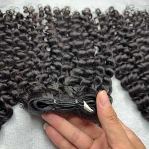 Extensions de cheveux humains bouclés eurasien 100% naturels, couleur noire naturelle, cheveux bouclés birmans bruts avec cuticules alignées - Product Image 1