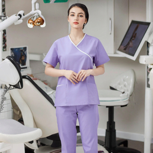 Custom Logo Women's Navy Blue <b>Scrub</b> <b>Set</b> White Piping Cross-Over Design V-Neck Medical Uniform for Nursing and Spa Professionals - Product Image 5