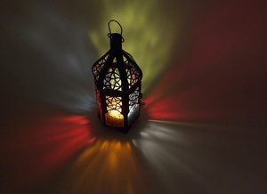 <b>Black</b> Iron <b>Lantern</b> With Colored Glass Panels And Intricate Cutout Design For Home Decoration - Product Image 6