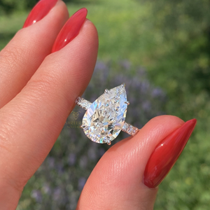 แหวนเพชรทรงลูกแพร์ 14K 18K VVS VS1 เพาะเลี้ยงในห้องปฏิบัติการ รับรองโดย IGI สำหรับงานหมั้นและงานแต่งงาน ขายส่ง - Product Image 1