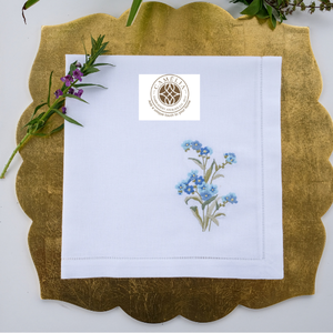 ผ้าลินินธรรมชาติปักลายดอกฟอร์เก็ตมีน็อต นุ่มแต่ทนทาน สร้างสัมผัสอ่อนโยนและอบอุ่นให้กับโต๊ะ - Product Image 1