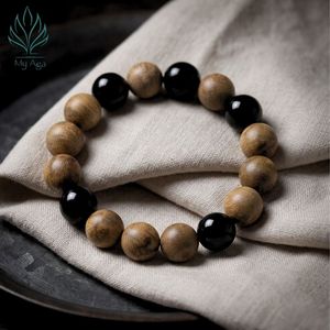 กำไลข้อมือไม้กฤษณาเวียดนามแบบคลาสสิกขายส่ง ทำด้วยมือ AL-SB-0010-12 ประดับด้วยลูกปัดปะการัง 5 เม็ด และลูกปัดไม้กฤษณาธรรมชาติ 12 เม็ด ของขวัญสุดพิเศษ - Product Image 3