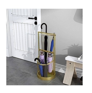 Porte-parapluie rond créatif en métal et cuir, style unique et décoratif pour jardin - Product Image 1