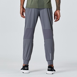 Pantalon de survêtement fuselé pour homme, anti-humidité, style cargo, en tissu tricoté de coton confortable pour la course et l'entraînement - Product Image 6