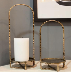 Modern minimalist gold <b>arch</b> candle stands with textured hammered metal <b>frames</b> & elevated platforms. Available at wholesale price - Product Image 1
