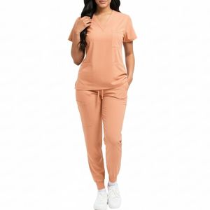 Ensemble d'uniformes médicaux premium pour infirmières, tenue de travail d'hôpital à manches courtes avec col montant, respirante, de haute qualité - Product Image 1