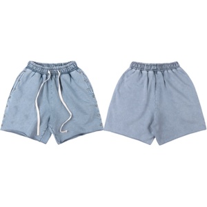 กางเกงขาสั้นทรงหลวมสบายๆ สำหรับผู้ชายผู้หญิง พร้อมหมุดย้ำด้านข้าง เอวยางยืด ดีไซน์เชือกผูก สตรีทแวร์ แฟชั่น กางเกงขาสั้นฤดูร้อน - Product Image 1