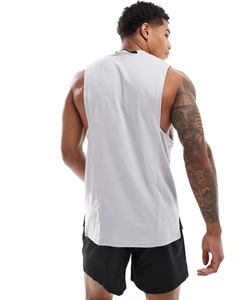 เสื้อกล้ามออกกำลังกายผู้ชาย ผ้าคอตตอน 100% ระบายอากาศ แห้งเร็ว ทรงสปอร์ต แคชชวล  แบบเรียบ  ไม่มีแบรนด์  สีขาวล้วน  ขอบยางยืด  รับสกรีนโลโก้ - Product Image 2