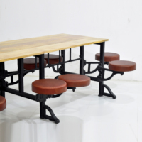 Table de salle à manger industrielle avec tabourets pivotants intégrés en cuir, plateau en bois de manguier massif, idéale pour hôtel, restaurant et atelier