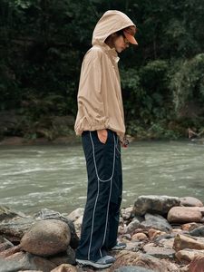 เสื้อแจ็คเก็ตซาฟารีสีดำแบบยูนิเซ็กซ์ ทรงหลวมสบาย ผลิตจากโพลีเอสเตอร์ เหมาะสำหรับใส่ในฤดูหนาว สีพื้นเรียบ ความยาวปกติ ระบายอากาศได้ดี เนื้อผ้าบาง - Product Image 5