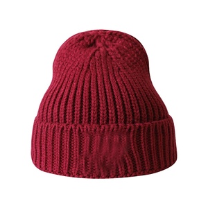 Gorro de invierno Unisex de algodón 100% de calidad superior, gorro tejido con etiqueta de logotipo personalizado, gorro cálido de Color sólido tejido para negocios de playa - Product Image 1