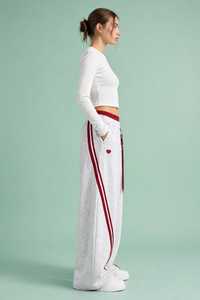 ชุดเซ็ตเสื้อครอปแขนยาวผ้าฝ้ายสไตล์สปอร์ต 2 in 1 สำหรับผู้หญิง พร้อมกางเกงขายาวทรงกระบอกเอวยางยืดและกระเป๋าข้าง - Product Image 2