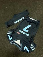 Conjuntos transpirables de uniformes de fútbol americano de sarga de aparejos impresos por sublimación personalizados de alta calidad para hombres y jóvenes