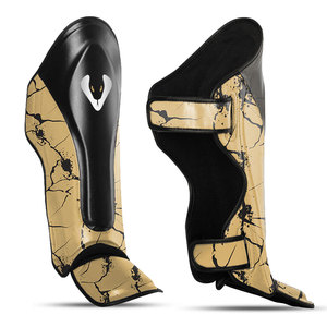 Espinilleras Venomous Golden Line con estampado craquelado de cuero para MMA, Muay Thai, Kickboxing, protección de piernas profesional ajustable - Product Image 1