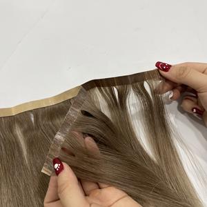 Extensiones de cabello de alta calidad con cinta adhesiva, precio de fábrica, hechas con cabello humano vietnamita 100%, superficie suave y puntas completas. - Product Image 1