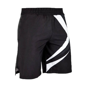 Shorts de MMA noirs pour hommes avec bandes diagonales blanches, en polyester respirant, coupe classique, vêtements de sport - Product Image 6