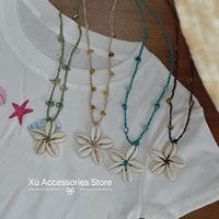 Kalung manik-manik gaya bohemian retro Vietnam untuk pemakaian sehari-hari, dengan liontin bunga kerang, menerima pesanan OEM/ODM.