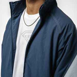 Ensemble survêtement coupe-vent personnalisé pour homme – Veste et pantalon de sport légers et résistants à l'eau – Fabricant en gros – Vêtements OEM - Product Image 4