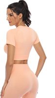 Ensemble de yoga pour femme avec logo personnalisé sur le devant, taille haute élastique, soutien-gorge de sport extensible et leggings de performance pour l'entraînement en salle de sport