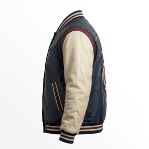 Blouson universitaire en cuir bleu marine sur mesure pour homme avec broderie tribale et manches crème – Fournisseur OEM/ODM de vêtements d'extérieur personnalisés - Product Image 4