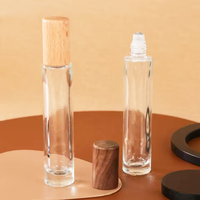 Vente en gros de flacons de parfum portables miniatures rechargeables en verre de 10 ml et 15 ml, avec vaporisateur et atomiseur, couvercle en bois, pour échantillons de parfum